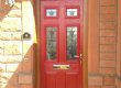 Red Composite Door in Oak Frame